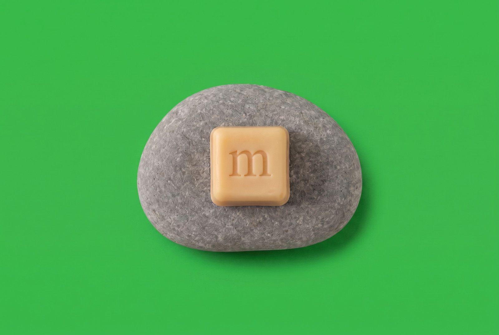 Kubix on a river stone